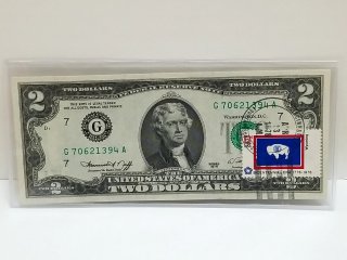 Item #77 — 1976 $2 Chicago, Unc, 1st day Issue stamped Wyoming photo 1 of 6
