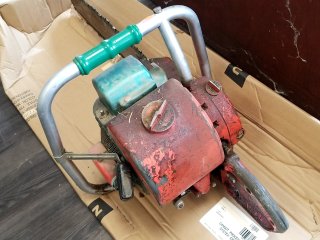 Item #265 — HOMELITE 700 Chainsaw, 22 inch blade, sells as is photo 2 of 4