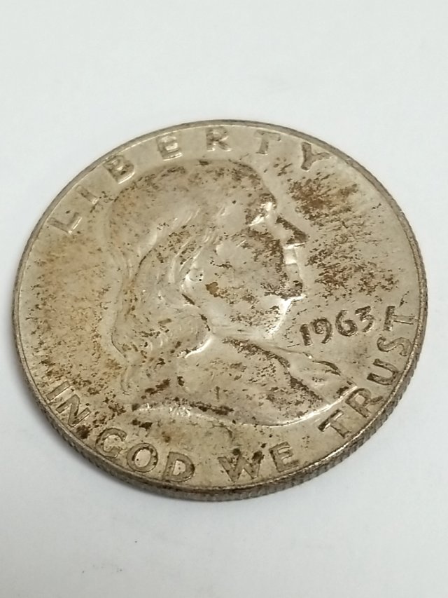 Item #25 — 1963 D Ben Franklin Silver Half Dollar photo 1 of 2