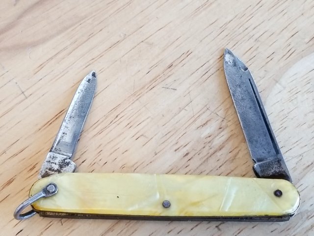 Item #46 — Vintage Yellow Pocket Knife, 8 in open photo 1 of 3