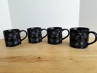 Item #137 — New Black Spiderweb Mugs Set