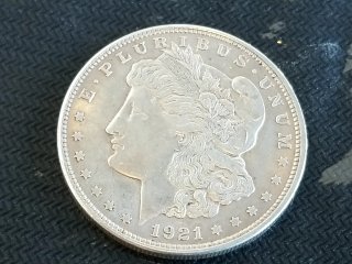 Item #37 — 1921 Morgan Silver Dollar Coin photo 1 of 2