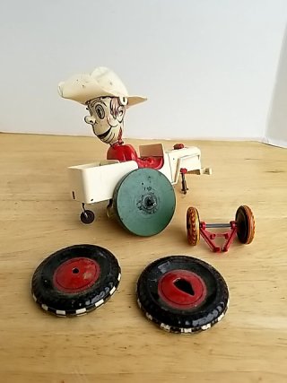 Item #88 — Vintage Tin Toy and parts photo 1 of 6