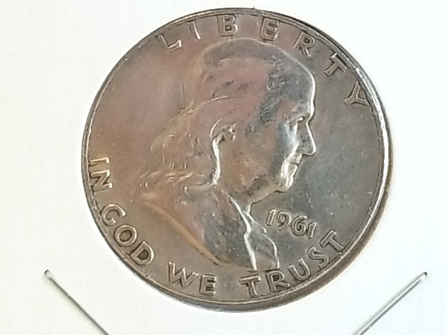 Item #16 — 1961 Franklin Half Dollar D photo 1 of 2