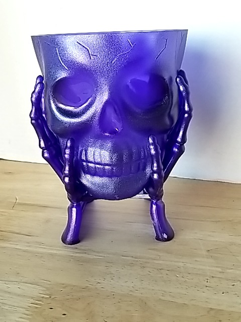 Item #394 — New Purple Skull Planter 7 by 6 inch photo 1 of 2