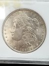 Item #117 — 1887 Morgan silver dollar photo 2 of 3