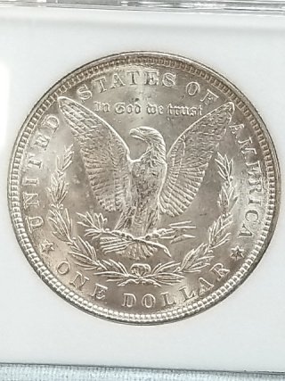 Item #117 — 1887 Morgan silver dollar photo 3 of 3