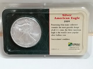 Item #1 — 2009 American Eagle silver dollar photo 1 of 3