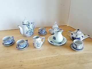 Item #157 — Blue Floral Porcelain Tea Set, tallest approx 4 inch