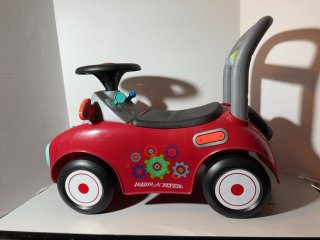 Item #475 — Red Ride-On Toy Car 21x17x11 photo 1 of 5