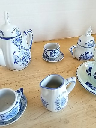 Item #157 — Blue Floral Porcelain Tea Set, tallest approx 4 inch photo 4 of 5