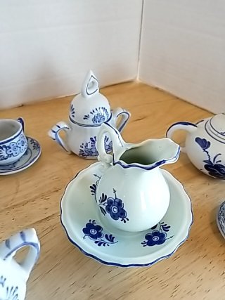 Item #157 — Blue Floral Porcelain Tea Set, tallest approx 4 inch photo 3 of 5