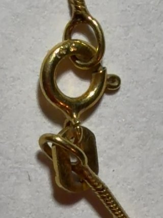 Item #150 — Marked 14kt gold necklace, 16 inch, weighs 2 grams photo 3 of 4