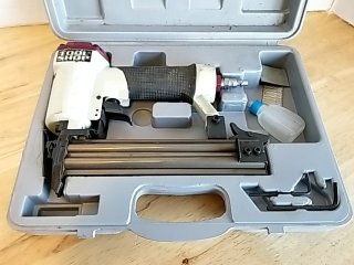 Item #28 — Pneumatic Nail Gun in Case photo 2 of 4