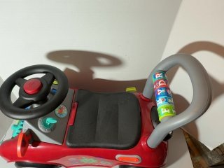 Item #475 — Red Ride-On Toy Car 21x17x11 photo 2 of 5