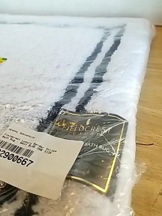 Item #29 — New bath rug 34 by 21 inch photo 2 of 2