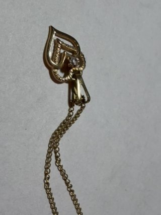 Item #153 — Marked 1/20 14kt gold pendant and chain necklace photo 3 of 4
