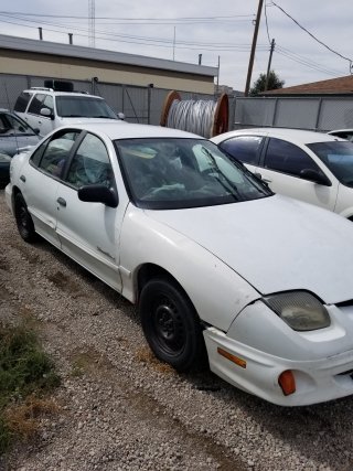 Item #5 — 2001 White Pontiac Sunfire	26-01959 photo 3 of 5