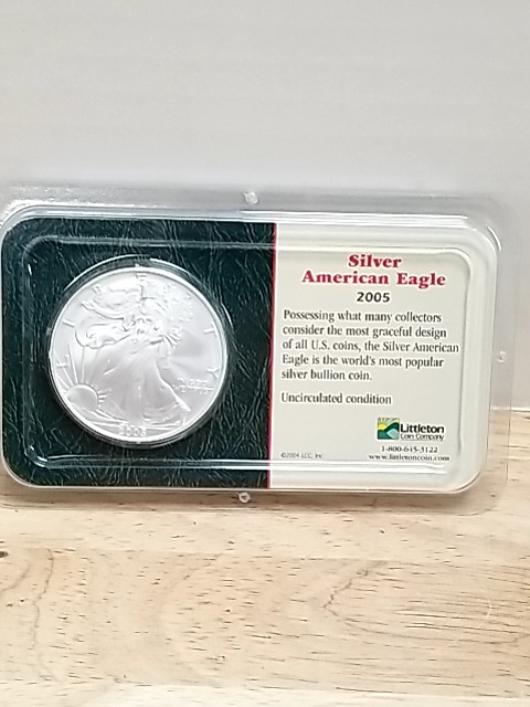 Item #63 — 2005 Silver American Eagle Coin photo 1 of 3