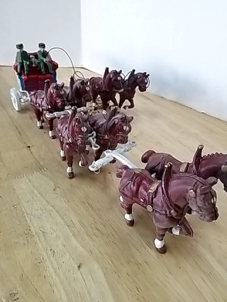 Item #15 — CAST iron horse and buggy, approx 5 inch tall photo 8 of 9