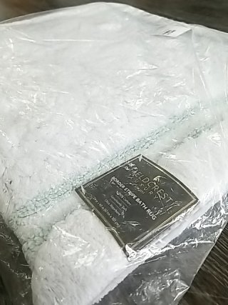 Item #88 — New White Plush Bath Rug in Plastic 24 by 40 inch photo 2 of 2