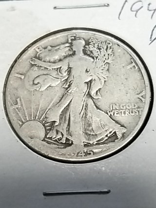 Item #67 — 1945 D Walking Liberty silver half dollar photo 1 of 2