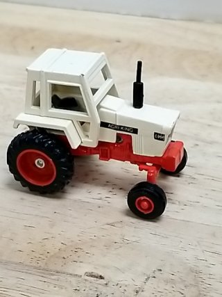 Item #74 — Vintage White Red Toy Tractor approx 2 by 2.5 inch photo 1 of 3