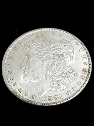 Item #6 — 1881-O Morgan silver dollar photo 1 of 2