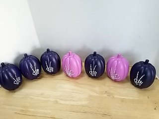 Item #55 — New Skeleton Hand Painted Pumpkins Each 5 inch photo 1 of 4