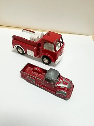 Item #30 — Old toy trucks, largest approx 4 inch photo 2 of 5