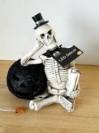 Item #124 — New Skeleton with Pumpkin LED Decor 7 inch tall photo 1 of 3