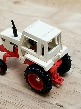 Item #74 — Vintage White Red Toy Tractor approx 2 by 2.5 inch photo 3 of 3