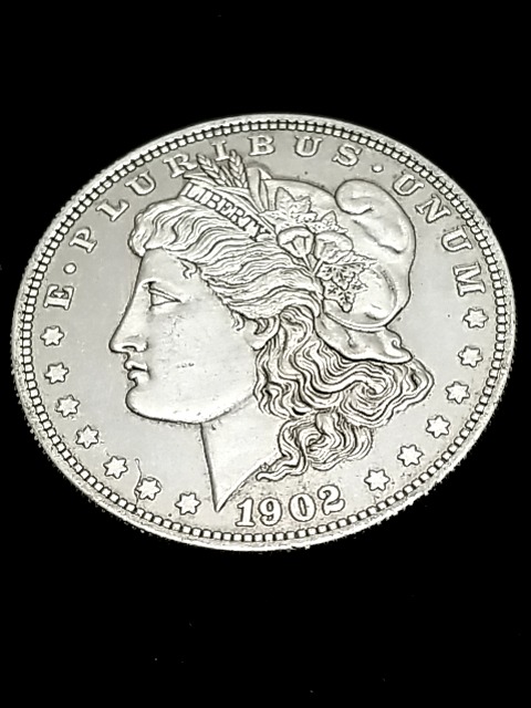 Item #30 — 1902 S Morgan Silver Dollar photo 1 of 2