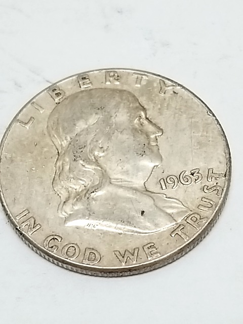 Item #125 — 1963 Silver Franklin Half Dollar photo 1 of 2