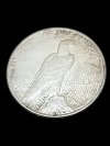 Item #41 — 1922 S Peace Silver Dollar photo 2 of 2