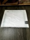 Item #93 — New White Bath Rug 24 by 40 inch photo 1 of 2