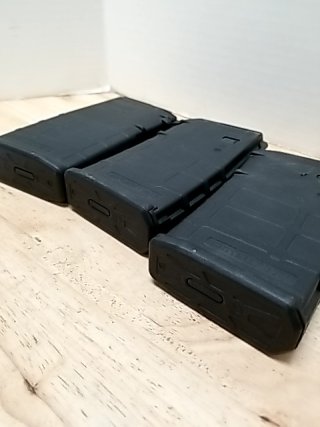 Item #10 — 7.62 x 51 ammo clips, each holds 20 photo 2 of 4