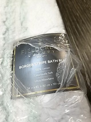 Item #93 — New White Bath Rug 24 by 40 inch photo 2 of 2