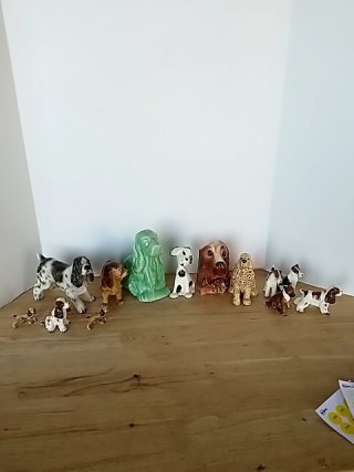 Item #402 — Dog figurine collection Most have damage photo 1 of 7