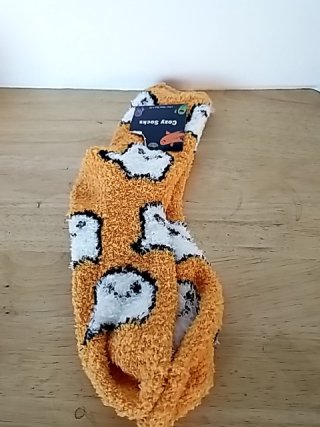 Item #201 — New Orange Ghost Fuzzy Socks Size 4-10 photo 1 of 2