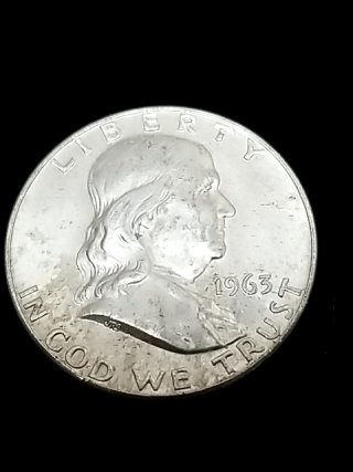 Item #12 — 1963 D Ben Franklin Silver Half Dollar photo 1 of 2