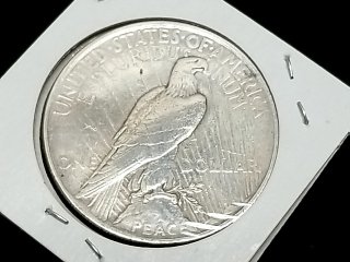 Item #60 — 1922 Peace Silver Dollar Coin photo 2 of 2
