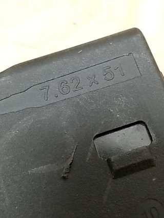 Item #10 — 7.62 x 51 ammo clips, each holds 20 photo 4 of 4