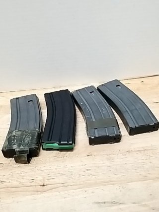 Item #76 — Metal AR-15 Magazines .223, each holds 30 photo 1 of 4