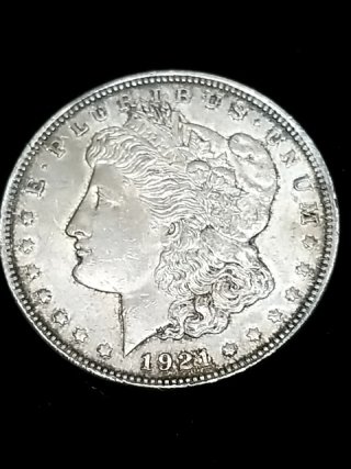 Item #95 — 1921 Morgan silver dollar photo 1 of 2
