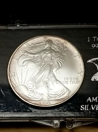 Item #72 — 1995 American Eagle Silver Dollar photo 2 of 3