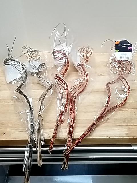 Item #104 — New Halloween Glittery Curly Vine Each 24 inches photo 1 of 4
