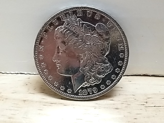Item #28 — 1879 O Morgan Silver Dollar, cleaned photo 1 of 3