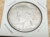Item #19 — 1922 D Silver Peace Dollar Coin photo 1 of 2