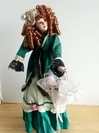 Item #402 — Victorian Porcelain Doll in Green Dress 14 inch tall photo 1 of 3